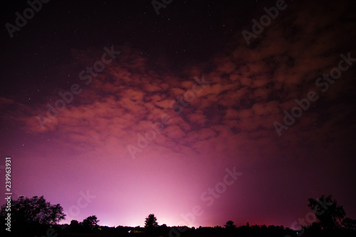 Night Sky Clouds And Stars Purple Sky With Light At Night