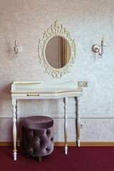 portrait of vintage vanity table set with mirror