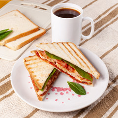 Toast with chicken, tomato, herbs and breakfast sauce