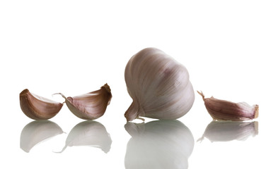 Whole garlic and few cloves isolated on white background