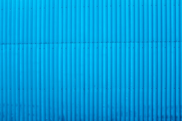 Blue industrial unit wall as used for background