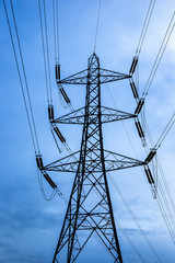 Electricity pylon isolated against blue sky