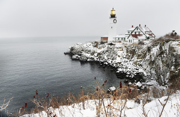 Lighthouse on the rocks on the Atlantic coast. The oldest lighthouse in Maine. USA. Portland
