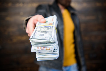 Illegal profit and black cash. Guy mafia dealer with cash profit. Brutal man has cash money....