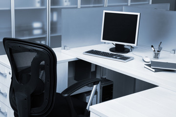 Naklejka na ściany i meble computer behind the glass in modern office