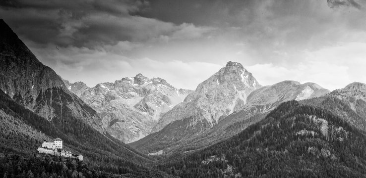 Tarasp Castle and the mountains of Swiss national park, Lower Engadin, Canton of Grisons, Switzerland, Europe