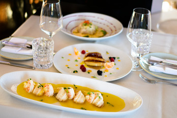 Luxury Restaurant Table, Shrimps, carpaccio and foie gras