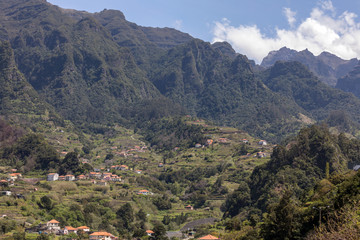 Fototapeta premium Village and Terrace cultivation in the surroundings of Sao Vicente. North coast of Madeira Island, Portugal