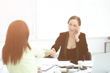 handshake Manager and client.women's power in business.photo with copy space