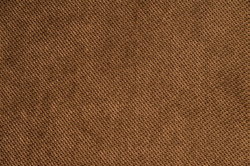 Textured background large brown textile. Texture of textile fabric close-up