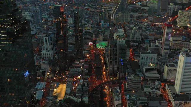 Bangkok skyline and skyscraper with bridge link between mrt and bts mass transportation on Sathorn Road center of business in Bangkok, Aerial top view, Bangkok, Thailand