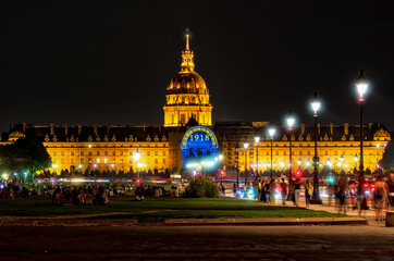 Espalnade des Invalides at night - Paris, France. Long exposure photography with car traffic.