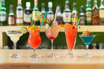 bar counter Cocktails drinks selection multicolored summer drinks