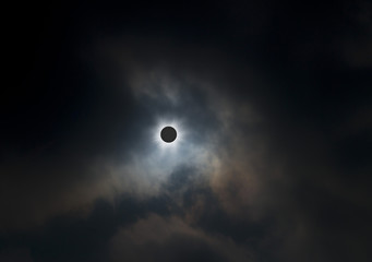 Total solar eclipse above the clouds - 239978981