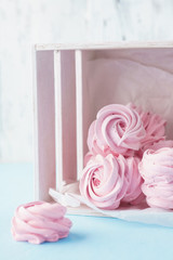 Homemade pink marshmallow or zephyr in a box. Romantic dessert.