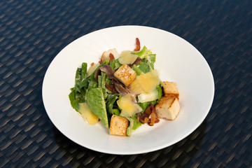 Ceacar vegetable Salad recipe homemade dressing, Fusion food stylish arrange on glass table along ocean mangrove tree Island, empty copy space for text logo Yummy