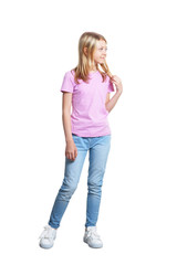 Fototapeta premium Cute girl in casual clothing posing on white background