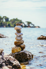 Spiritual stonemen at the coast of Croatia, ocean
