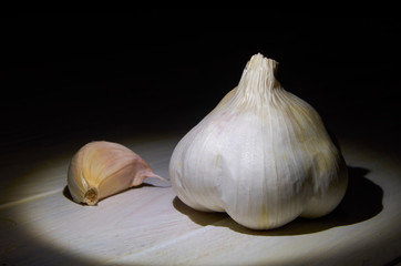 Still life of a head and a clove of garlic