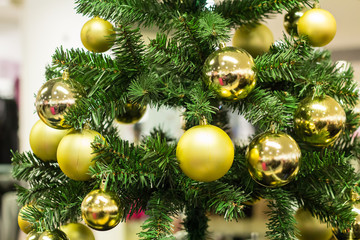 a decorated Christmas tree in the mall