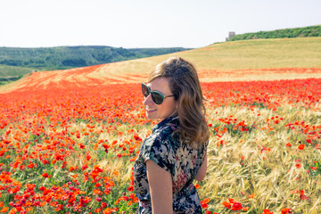 woman in poppy field