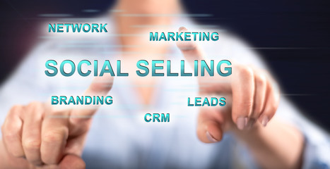 Woman touching a social selling concept