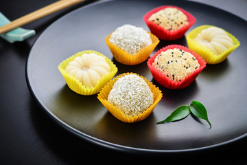 Mochi assortment on plate with chopticks