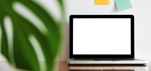 Stylish desk with laptop mock up. Minimal workspace desk of designer.	