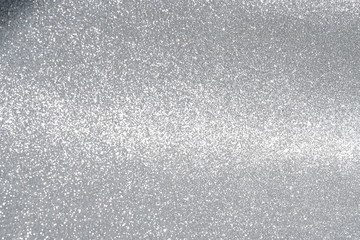 Silver sparkle glitter abstract bokeh background Christmas