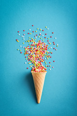 Ice cream cone  with colorful stars confetti