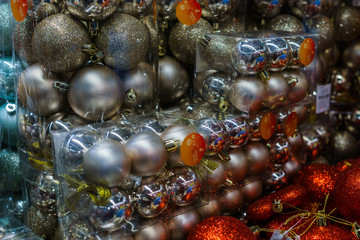 Various multicolored Christmas toys and decorations for sale in the store