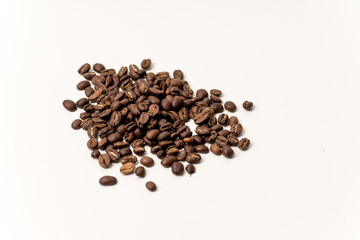 brown coffee beans on a white background