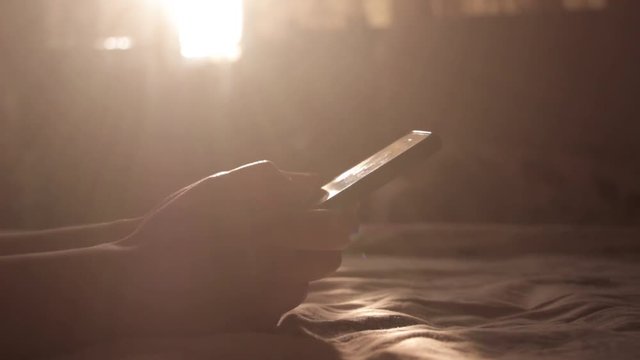 A Girl Typing and Scrolling on her Mobile
