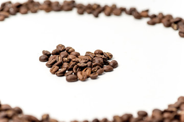 brown coffee beans on a white background