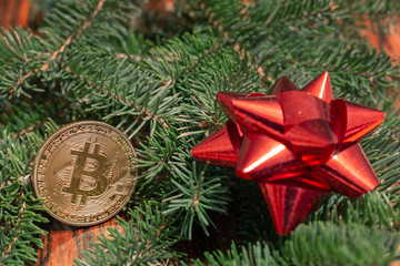 Cryptocurrency Bitcoin on the christmas holiday backgrounds