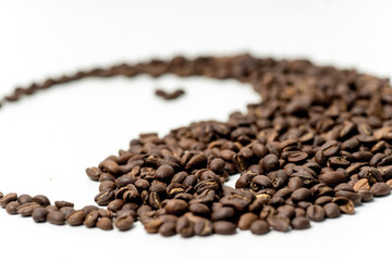 brown coffee beans on a white background