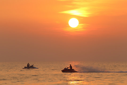 Jet skiing in the evening in the Bay of Bengal in the vicinity of Pattaya