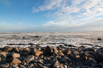 stony sea shore, winter