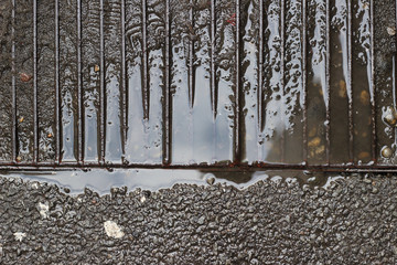 Grate asphalt street drainage clogged detail puddle