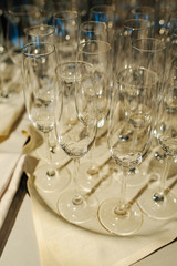 Wine glasses in a restaurant setting. Serving on the table. Crystal glasses for catering