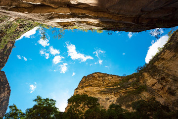 Looking up to the sky from the bottom of a canyon in Toro Toro National Park Bolivia