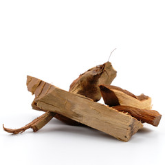 Fragrant Wood chips on white background.