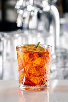 classic negroni cocktail closeup on bar counter