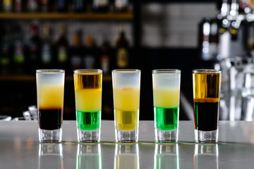 set alcohol shot on the bar background with copy space