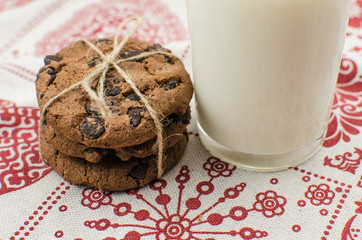 freshly baked chocolate chip cookies on rustic wooden table