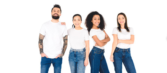 multicultural friends posing and looking at camera isolated on white