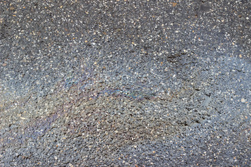 Wet asphalt pavement oil spill texture surface