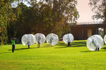 Bubble bump. Team game outdoor. Fun for teenagers. toned