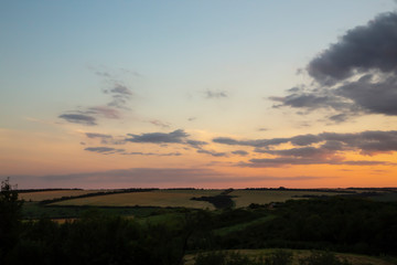 Fototapeta na wymiar Sunrise step by step in the countryside. Summer landscape.