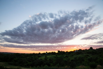 Sunrise step by step in the countryside. Summer landscape.